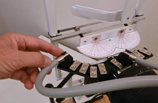 A hand holding a metal tube
Description automatically generated with medium confidence