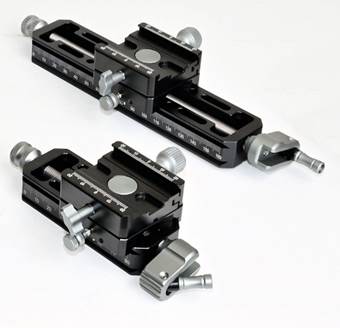 A pair of black and silver metal objects
Description automatically generated