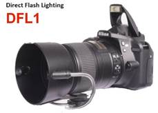 A close up of a camera
Description generated with high confidence